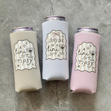 Load image into Gallery viewer, Bride in A Tini Bit and A Tini Bit Tipsy Bachelorette Slim Can Coolers
